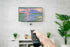 TV Download of Elizabeth Sheats Painting "Golden Hour" which features a sunset and is shown in a mockup.
