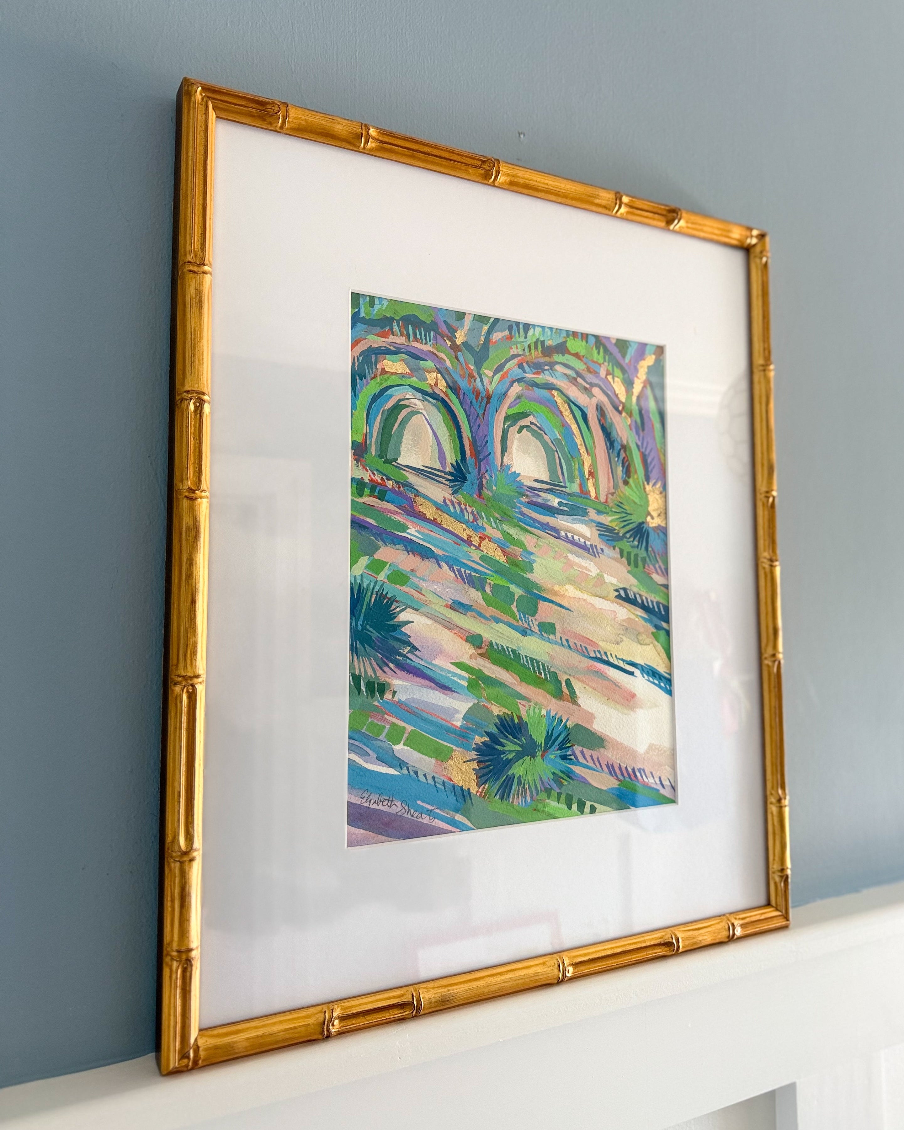 Framed artwork on a gray wall by Elizabeth Sheats